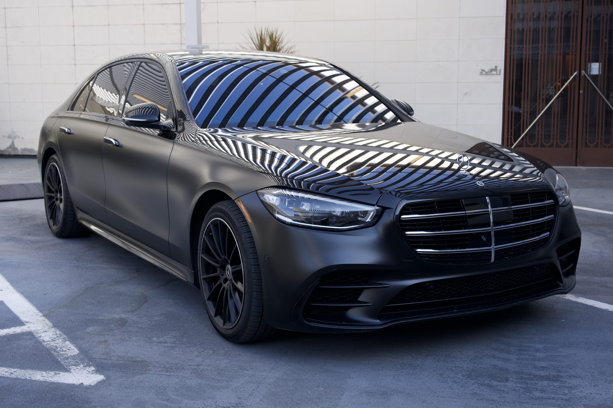Front angle of the Mercedes-Benz S580 rental in Houston, showcasing its bold grille and modern design.
