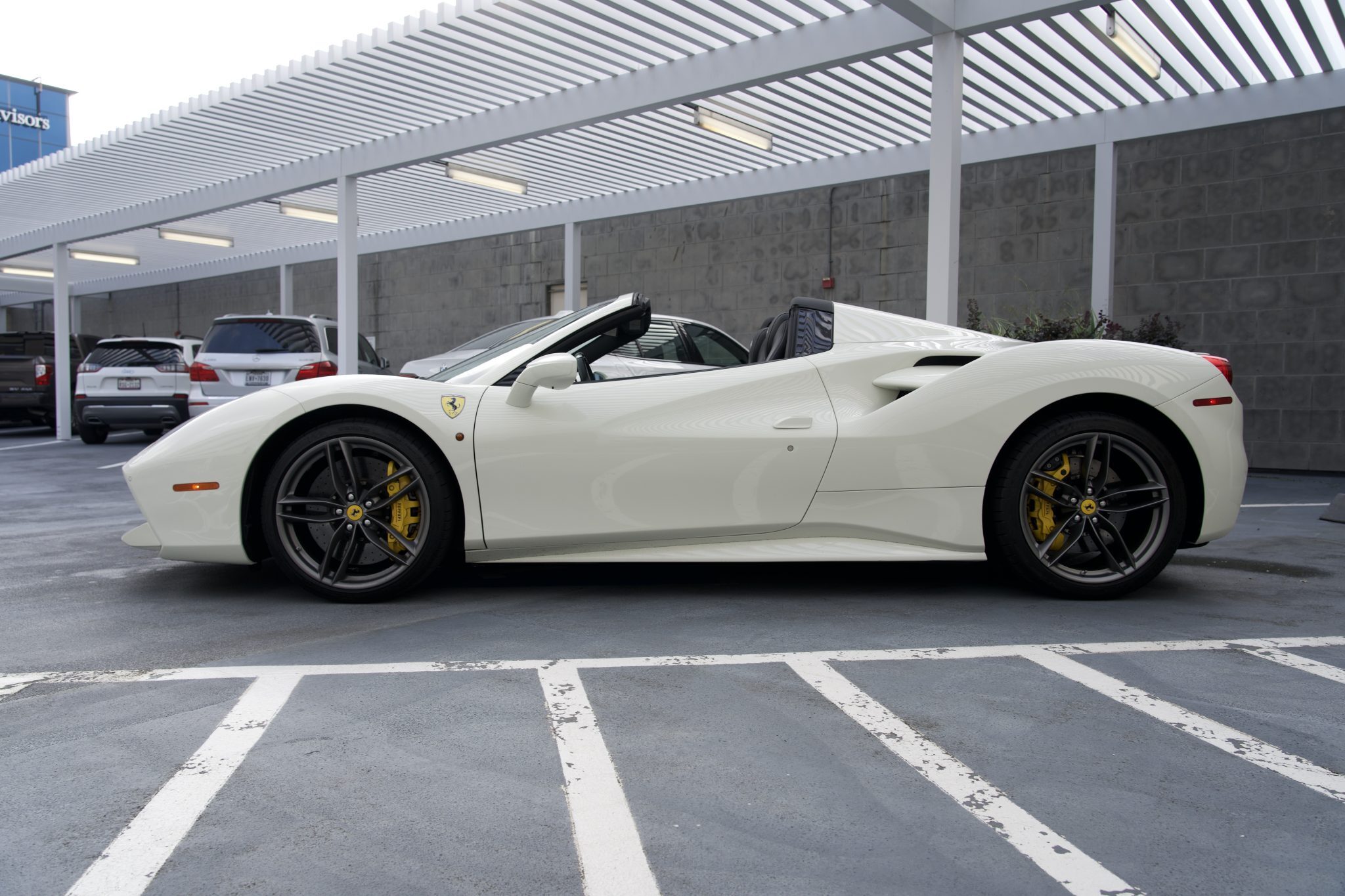 Ferrari 488 Spider luxury car, showcasing its full exterior design for rentals in Houston.