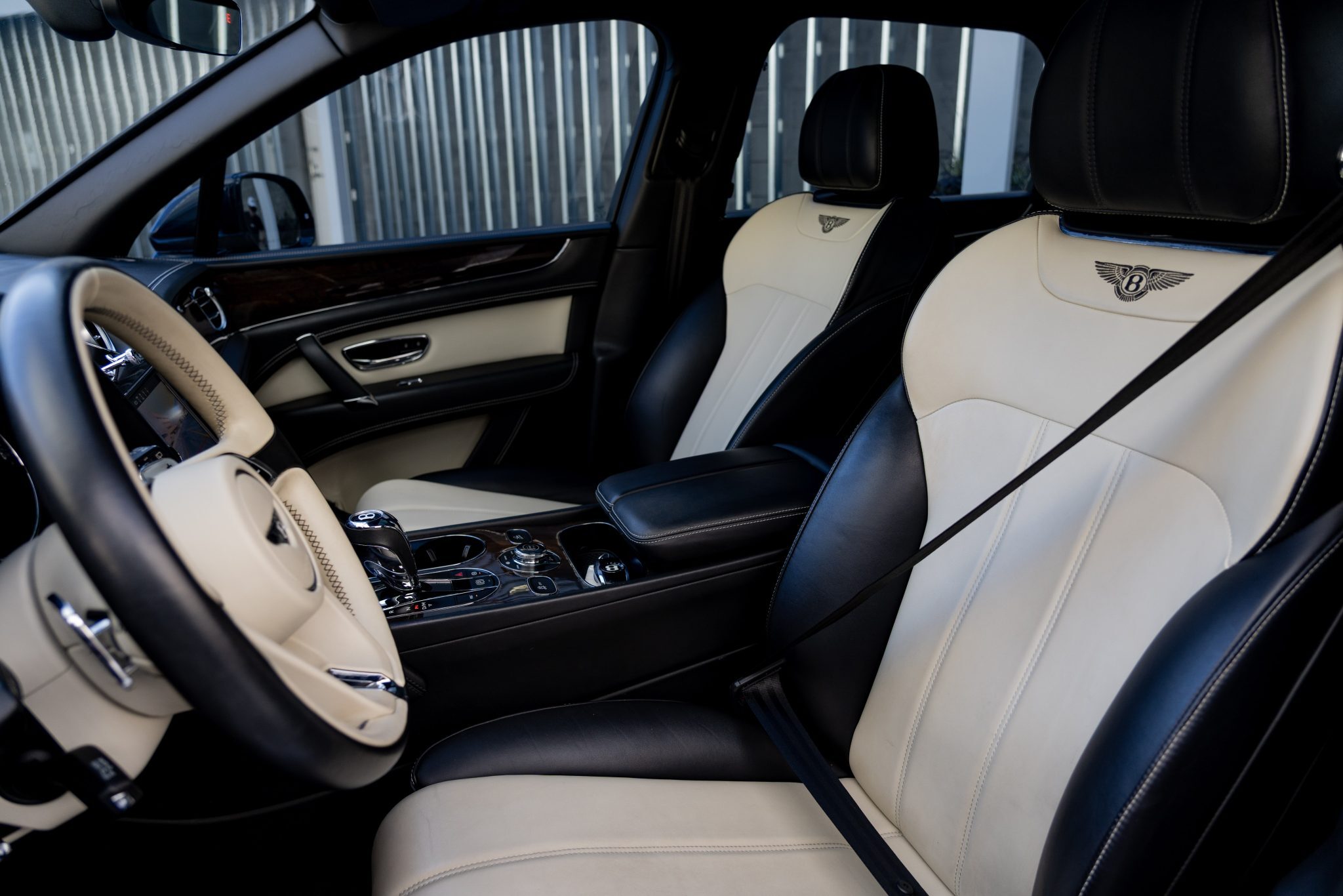 Bentley Bentayga front seats – Luxury SUV rental with premium leather interior in Houston.