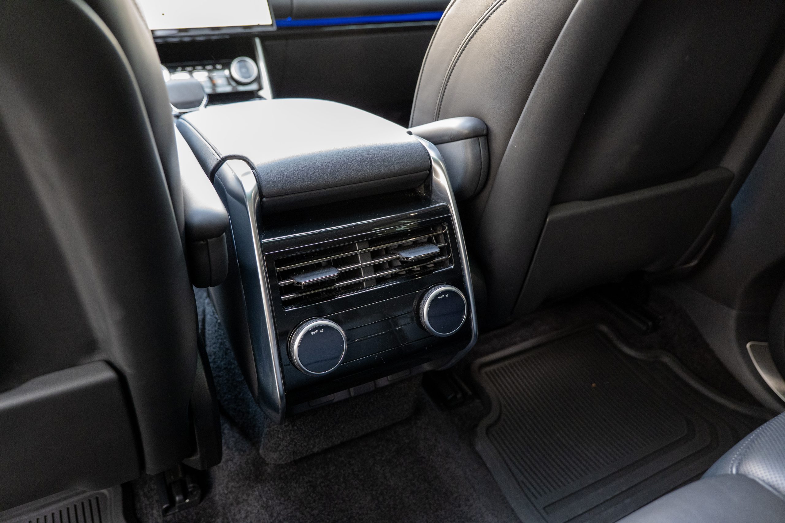 Rear passenger climate and comfort controls in Range Rover
