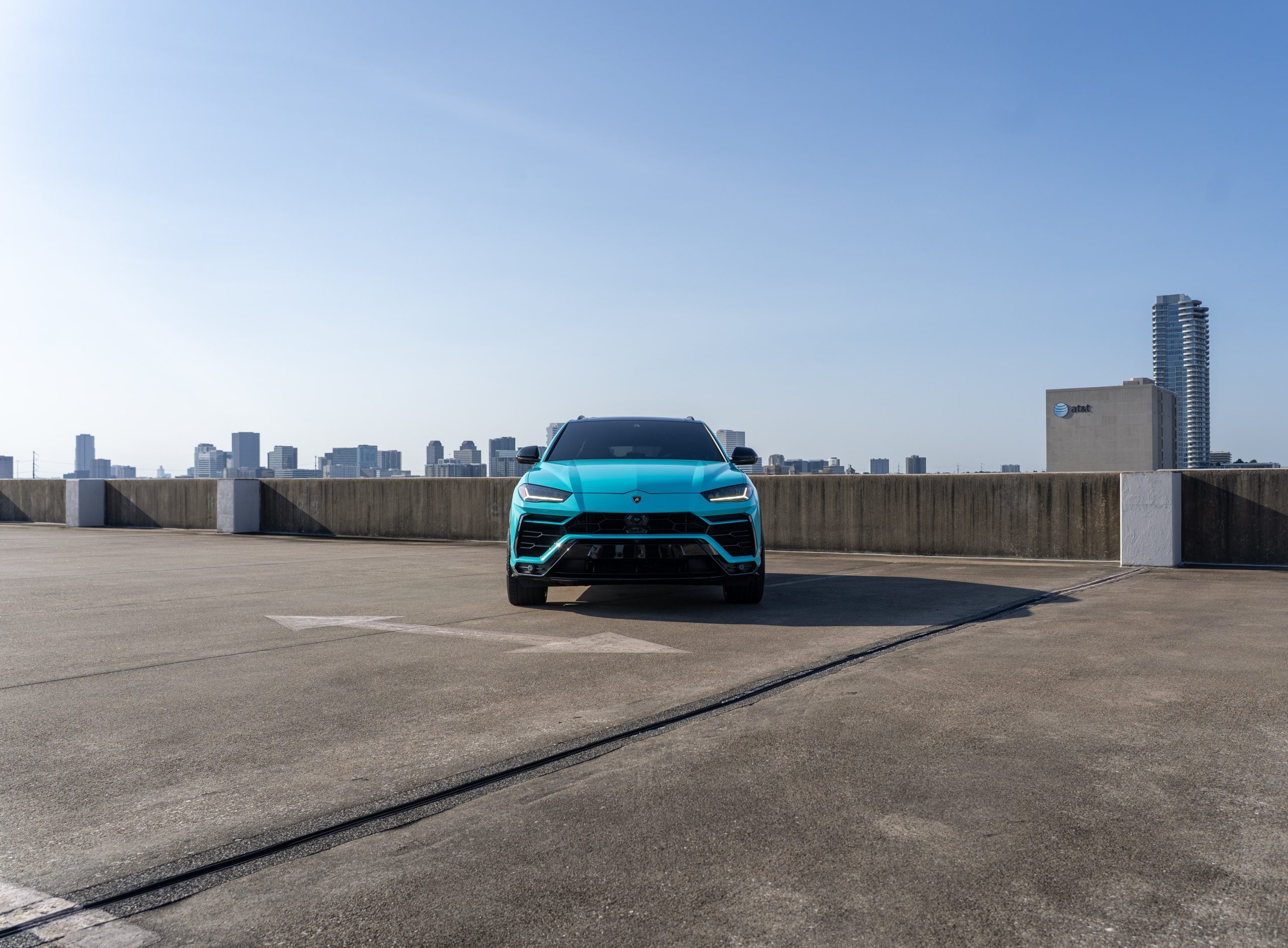 Turquoise Urus front angle Houston luxury rental