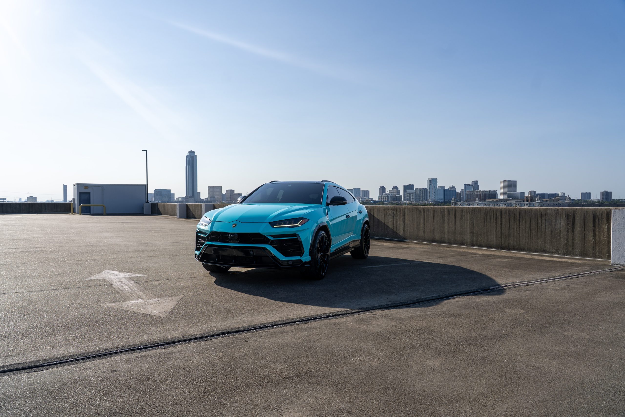 Lamborghini Urus side profile Houston luxury SUV rental