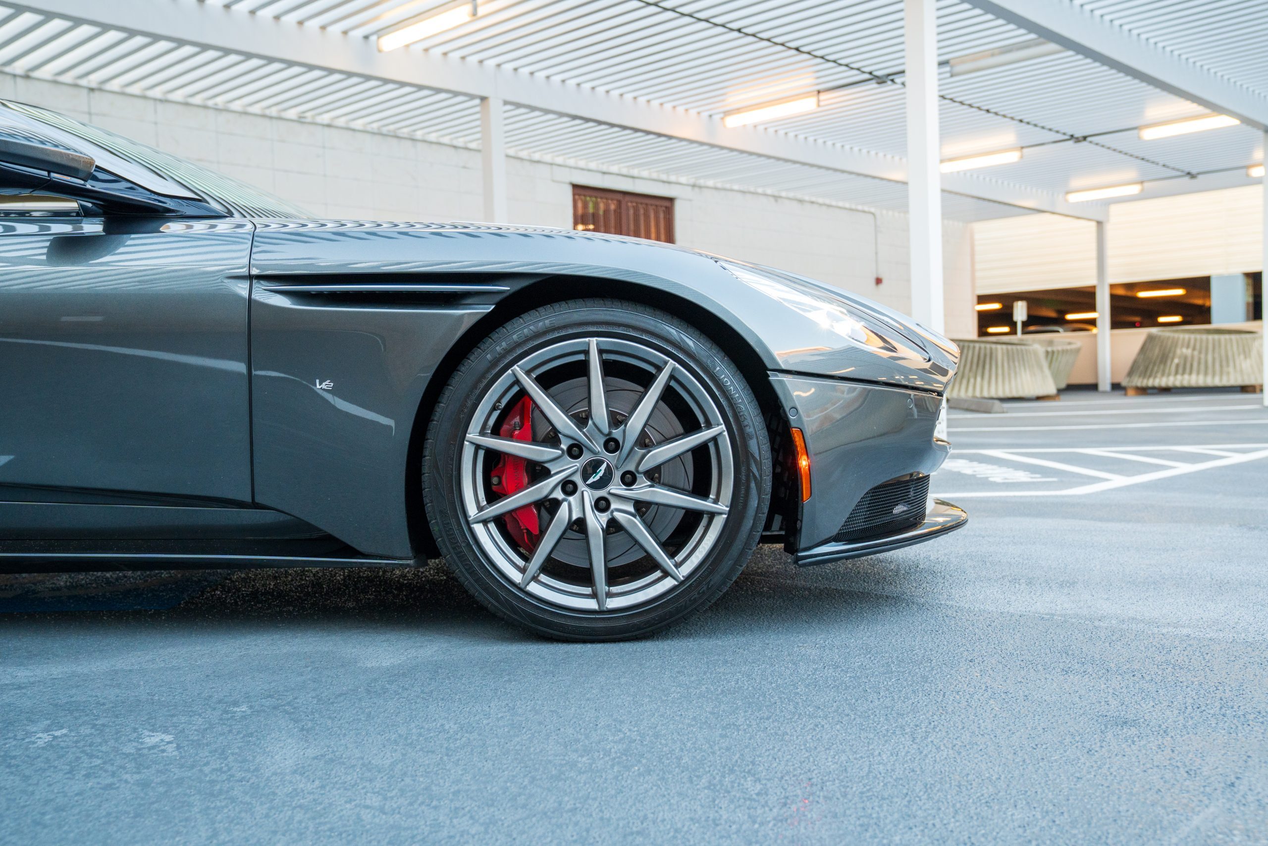 ston Martin DB11 wheel detail close up Houston rental